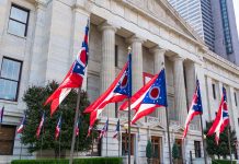 Ohio flags outside a government building.