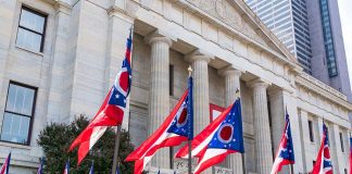 Ohio flags outside a government building.