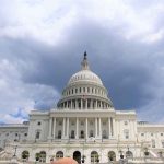 United States Capitol building under cloudy sky