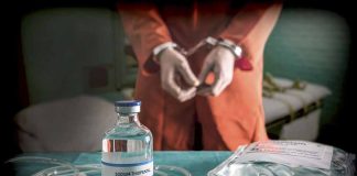 Handcuffed person with sodium thiopental vial and IV bag