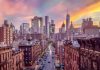 City skyline at sunset over busy urban street