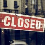 Closed sign in store window