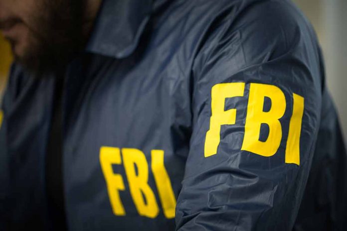 Person wearing FBI jacket with yellow lettering