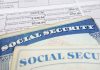 Social security cards on top of tax documents