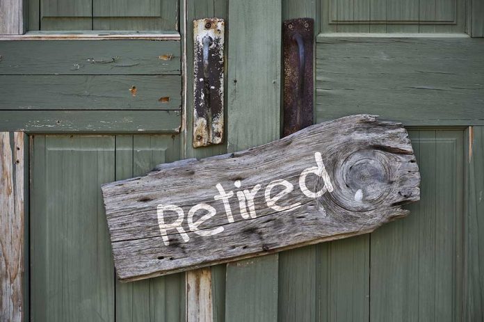 149656133 featured image Rustic retired sign on green wooden door