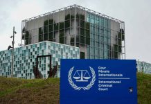 International Criminal Court building with sign in foreground