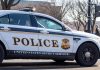 United States Secret Service police car on roadside.