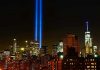 New York City skyline at night with memorial lights