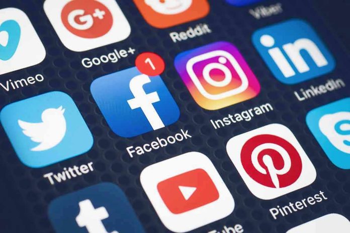 573033001 Social media app icons displayed on a smartphone screen