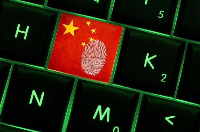 shutterstock_240941041.jpg Close-up of a keyboard key featuring the Chinese flag and a fingerprint