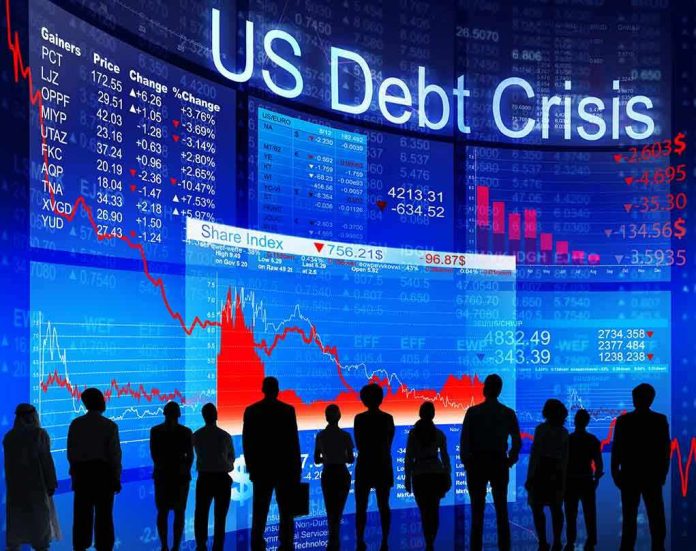 174966974 People looking at financial charts displaying US debt crisis.