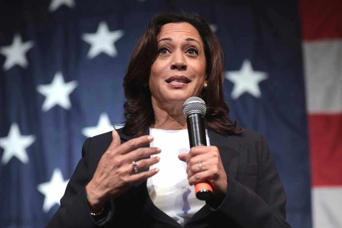 185042987 Woman speaking with microphone, American flag background.