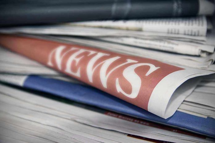 568781608 Stack of newspapers with NEWS headline visible.
