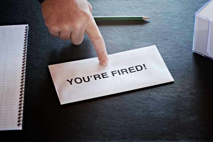 Envelope with YOURE FIRED! and pointing finger.