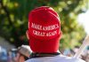 Person wearing a red Make America Great Again hat.