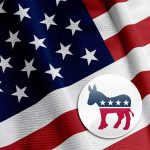 Florida Politician’s Surprising Party Switch Gains Unexpected High-Profile Endorsement United States flag with Democratic Party donkey symbol.