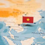 Diplomatic Strain Intensifies – Executions Spark China-Canada Tensions Vietnamese flag on a world map.