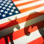 New Polls Reveal Unprecedented Dip in Support for Democrats Donkey and elephant shadows on American flag.