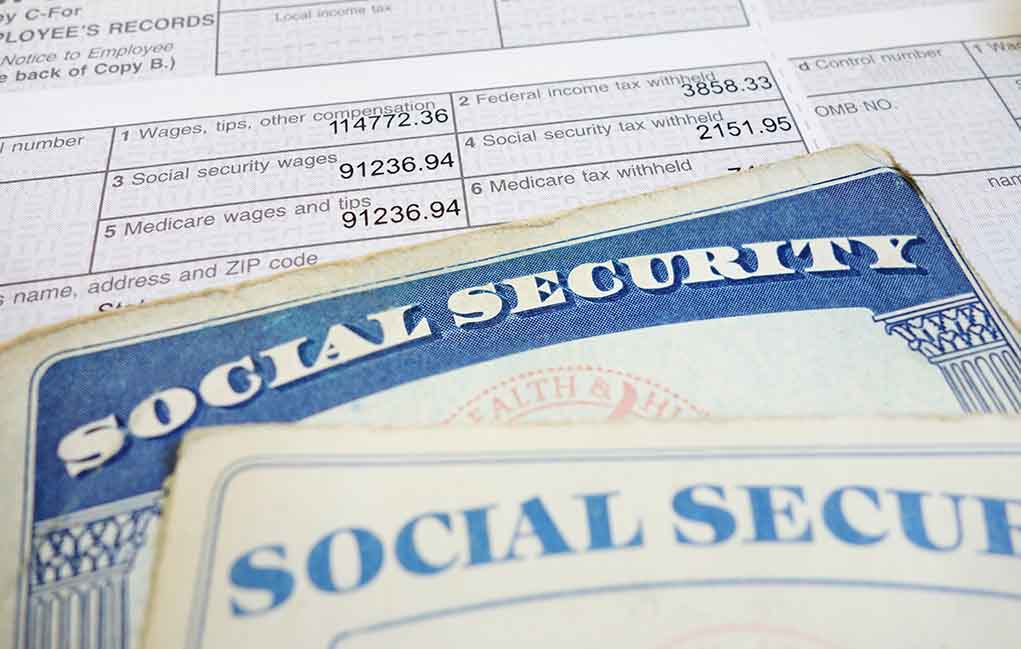 126890366 featured image Social security cards on top of tax documents