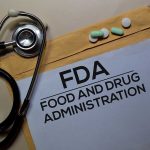 Mysterious Illness Traced to Ready-to-Eat Foods Prompts Urgent Recall Stethoscope and FDA documents with pills and pen