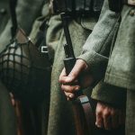 North Korean Troops Enter Russia—Sanctions SHATTERED Soldiers in uniform holding rifles and grenades