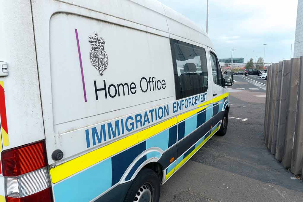 2212785583 featured image White immigration enforcement van parked by roadside