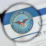Shocking $831 Billion Defense SURGE Magnifying glass over Department of Defense logo