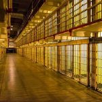 Shocking Death Sparks Prison OUTRAGE Empty hallway between rows of prison cells