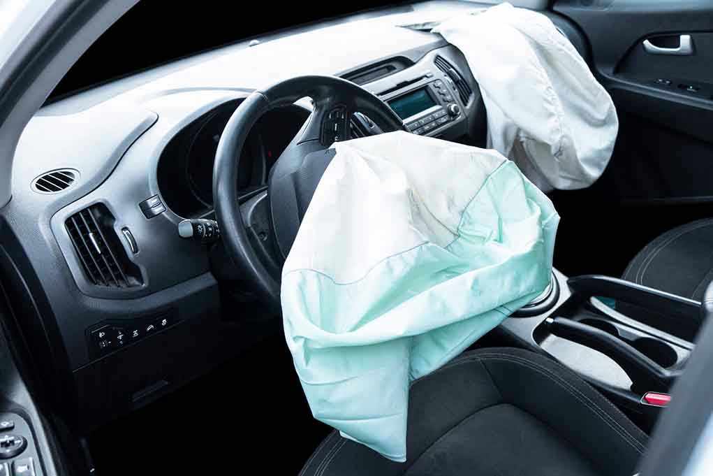 1913751205 Deployed airbags in car's interior