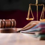 Shocking Legal Twist: Retro Cash Reexamined Judges gavel scales of justice and legal documents