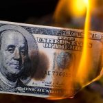 ICE Riot Damage SKYROCKETS — Taxpayers Stunned Hundred dollar bill burning with orange flames