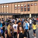 SCOTUS Ruling IGNITES Liberal Uproar A large group of students socializing outside a school building
