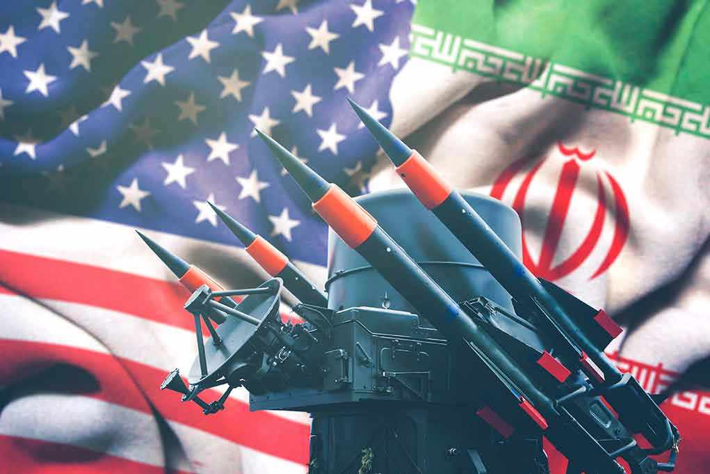 Iran and USA flags with missile launcher