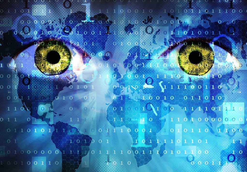shutterstock_178246889.jpg Abstract image featuring human eyes overlaid with binary code and a world map
