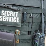 Secret Service OUTRAGE – Behavior Infuriates Nation Secret Service vest with various tactical gear attached.