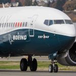 Boeing Deal BETRAYS 346 Crash Families – DOJ Intervenes! Boeing 737 MAX airplane on runway.