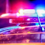 Ex-Congressman BUSTED — Political Comeback Destroyed Police car lights flashing at night.