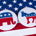 Shocking Democrat Defection: They’ve ABANDONED PARTY! Republican elephant and Democrat donkey on American flag.