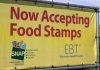SNAP COLLAPSES: 42 Million EBT Cards Go Dark! Yellow sign now accepting food stamps EBT SNAP