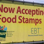 SNAP COLLAPSES: 42 Million EBT Cards Go Dark! Yellow sign now accepting food stamps EBT SNAP