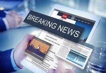 Breaking news on a digital tablet screen.