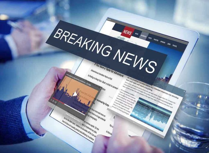 435654307 Breaking news on a digital tablet screen.