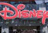 ANOTHER Disney Death – Tragedy Strikes AGAIN! Bright red Disney logo displayed on a storefront window
