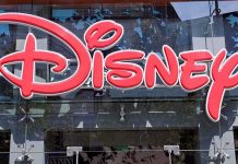 ANOTHER Disney Death – Tragedy Strikes AGAIN! Bright red Disney logo displayed on a storefront window
