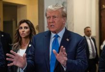 Baseball Bat ATTACK Rocks Trumps Lawyers Office! Man speaking with hands raised, woman and security behind.