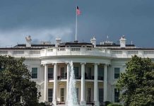 Trump, Mamdani MEET – Tense Opening Exchanges White House with American flag and fountain, stormy sky.