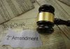 18-Year-Olds Packing Heat? Judge Says Yes! Gavel on US Constitution with Second Amendment text