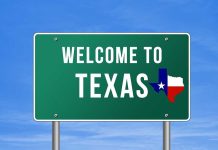 Governor THREATENS 100% Tariff Against Americans Welcome to Texas road sign with a Texas map