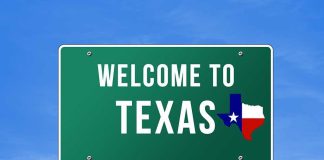 Welcome to Texas road sign with a Texas map