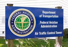 Sign for the Federal Aviation Administration at an air traffic control tower